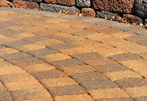 How Proper Joint Sanding Improves Paver Stability and Reduces Weeds